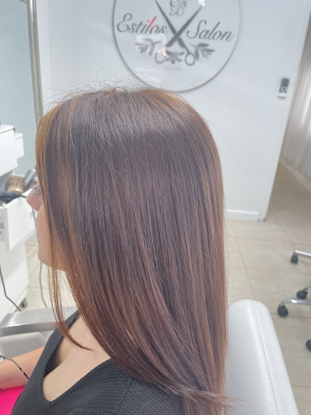 Elegant salon interior with professional stylist working